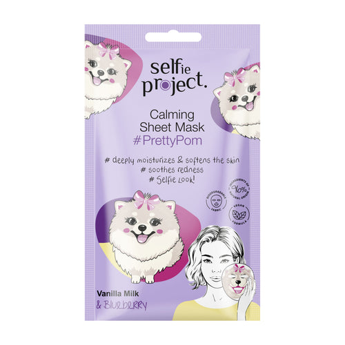 Selfie Project Calming sheet mask packaging with cartoon dogs and a woman's face on a white background