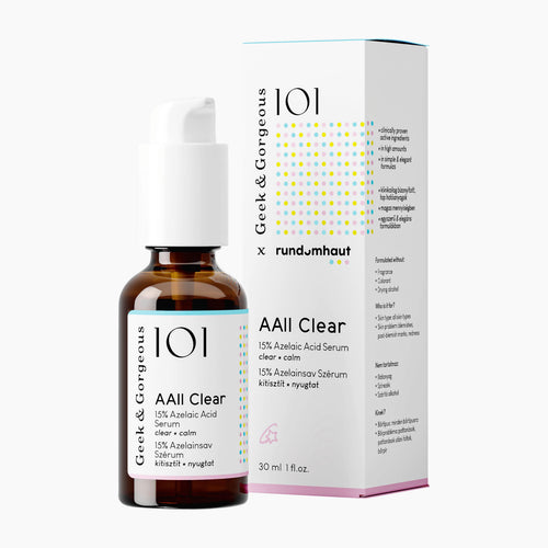 A 101 Geek & Gorgeous x rundumhaut AAll Clear skincare set, featuring an amber glass bottle with a white cap and a white product box with yellow and blue polka dots, on a light gray background.