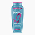 A bottle of L'Oréal Paris Elvital Fibralogy shampoo in a translucent light blue bottle with a magenta cap and magenta graphic accents, shown on a plain white background.