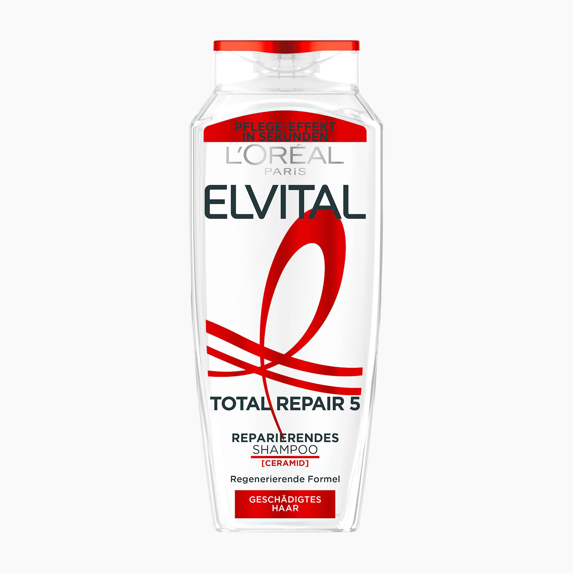 A bottle of L'Oréal Paris Elvital Total Repair 5 Repairing Shampoo with a white body, red cap, and red and black text on a light gray background.