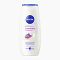 A 250ml bottle of Nivea Cashmere & Cottonseed Oil shower gel on a light gray background.