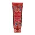 Red tube of Tesori d'Oriente Dragon Flower shower cream on a white background