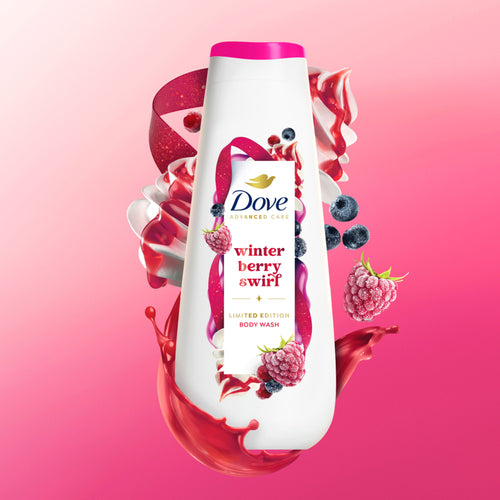 Dove winter berry swirl body wash bottle with berries on a pink background