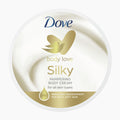A jar of Dove Body Love Silky Pampering Body Cream with gold and blue branding on a clean white background.
