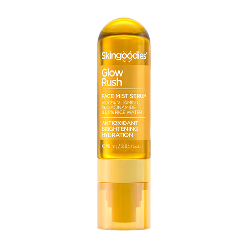 Skingoodies Glow Rush Face Mist Serum in a translucent amber-yellow bottle with a matching cap, shown on a solid white background.
