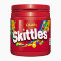 A red plastic jar of Skittles Fruits candy, featuring the classic colorful label with the white Skittles logo and multicolored candy graphics, set against a plain white background.