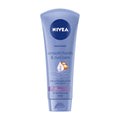 A tube of Nivea Smooth Hands & Nail Care hand cream with macadamia nut oil. The packaging is predominantly blue with the Nivea logo at the top and an image of a macadamia nut.