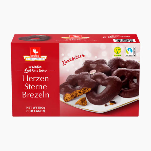 A 500g box of Weiss Dark Chocolate Covered Soft Gingerbread Hearts Stars Pretzels on a clean white background. The packaging is primarily red with a photo of heart-shaped chocolate sprinkles on a white plate.