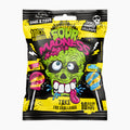 A bag of Sour Madness Skull Pops Lollies, featuring a bold black and yellow packaging design with a green zombie face illustration and illustrations of pink and blue lollipops.