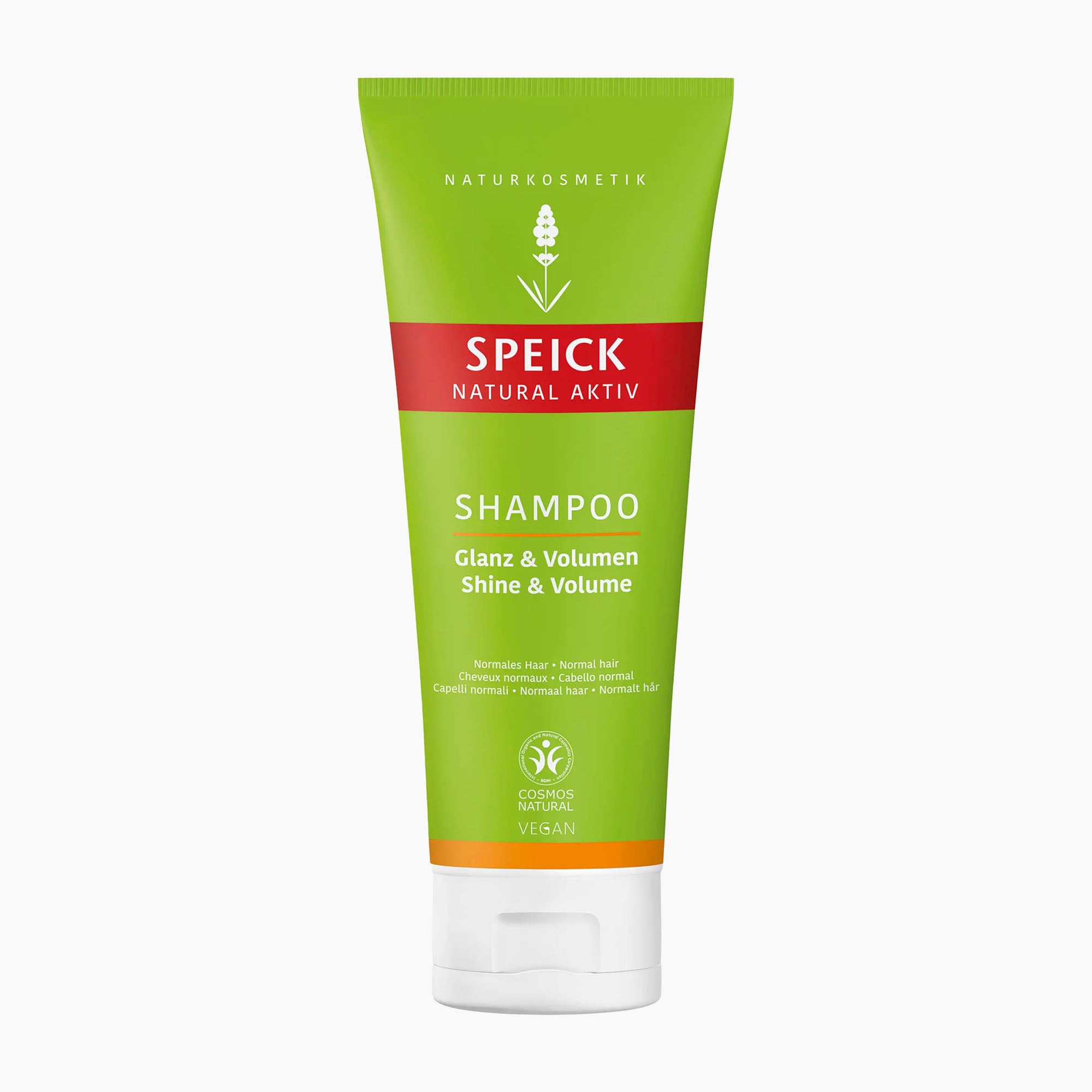 A tube of Speick Natural Aktiv Shine & Volume Shampoo on a clean white background. The tube is lime green with a bold red band across the middle containing the white Speick brand logo, and a small orange accent band near the bottom.