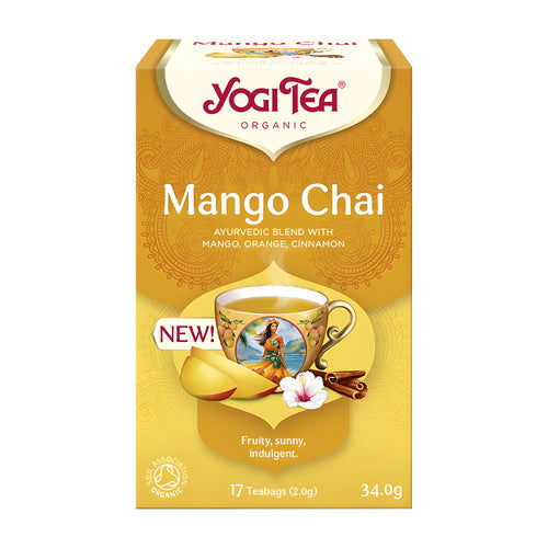 Yogi Tea Mango Chai tea box with tea cup and ingredients on a white background