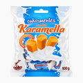 A 100g bag of Eden Werk Sugar Free Toffee, featuring a white and blue wrapper with illustrations of three orange caramel candies and a milk splash graphic.