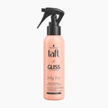 Schwarzkopf taft x GLISS Hair Repair 'Lovely Long' Multitasking Heat Protection Spray bottle in a soft peach-pink color with a black spray nozzle, on a solid white background.