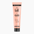 A tube of Schwarzkopf taft x GLISS Hair Repair Sleeky Smooth Smoothing Cream in a peach-pink color with a black cap, shown on a light gray background.
