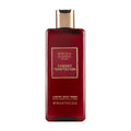 A bottle of Baylis & Harding The Edit cherry temptation luxury body wash with a rich red color and a gold-colored cap.