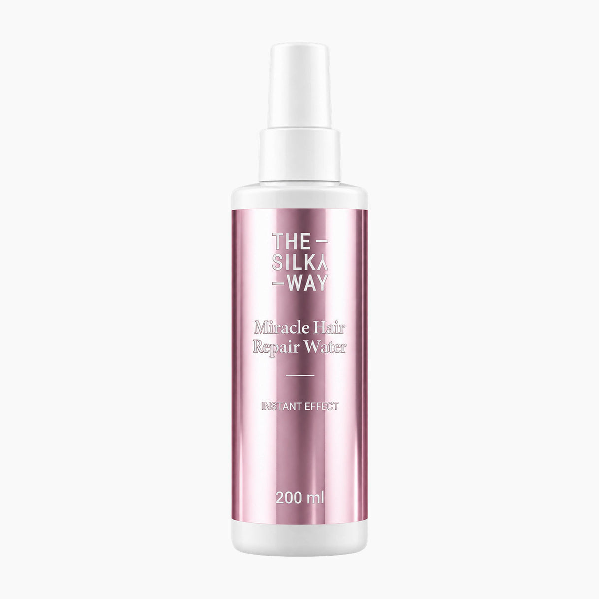 A 200ml spray bottle of The Silky Way Miracle Hair Repair Water, featuring a metallic pink label and a white spray nozzle, centered on a light gray background.