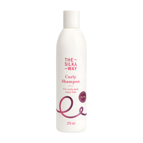 The Silky Way Curly Shampoo bottle on a white background