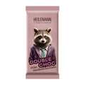 Chocolate bar packaging with a raccoon illustration and Heilemann Confisserie branding on a pink background.