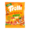Packaging of Trolli Peach Rings gummy candy with cartoon characters on a white background.