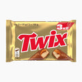 A package of 3x2 Twix biscuit bars in a shiny gold wrapper with the red Twix logo and images of the chocolate-coated candy bars on a white background.
