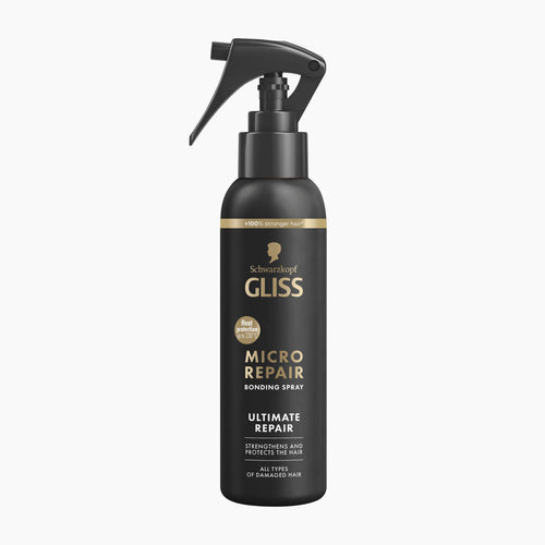 Schwarzkopf Gliss Ultimate Repair Micro Repair Bonding Spray in a matte black spray bottle with gold lettering, shown on a light gray background.