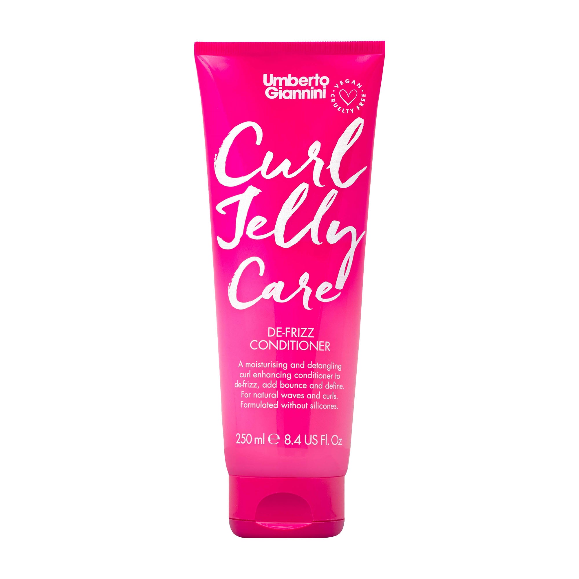 Pink tube of Umberto Giannini Curl Jelly Care conditioner on a white background