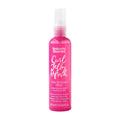 Pink bottle of Umberto Giannini Curl Jelly Refresh spray on a white background