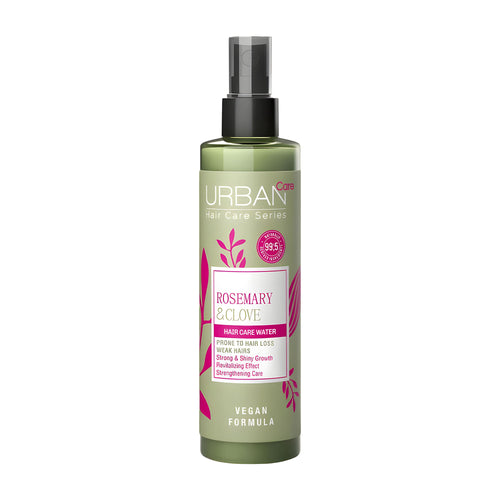 Bottle of Urban Care Rosemary & Clove hair care water on a white background