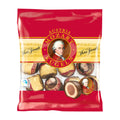 Packaging of Victor Schmidt Mozart Kugeln pralines, showing the product name and images of Mozart's face on the packaging, indicating the chocolate balls are a tribute to Mozart.