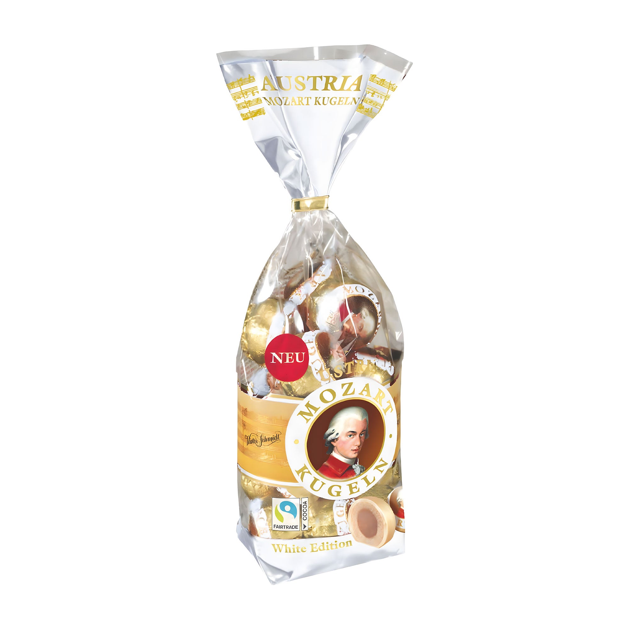 Packaging of Victor Schmidt Mozart Kugeln White pralines, showing a clear window with the white chocolate pralines inside, and branding information on the label.
