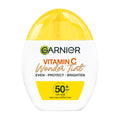 Garnier Vitamin C Wonder Tint Medium Shade SPF50+ sunscreen bottle on a white background