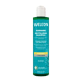 Weleda Rosemary Revitalizing Shampoo bottle on a white background