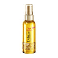 A pump bottle of Wella Deluxe Rich Oil for dry hair, with a yellow label and 100 mL volume indicated.