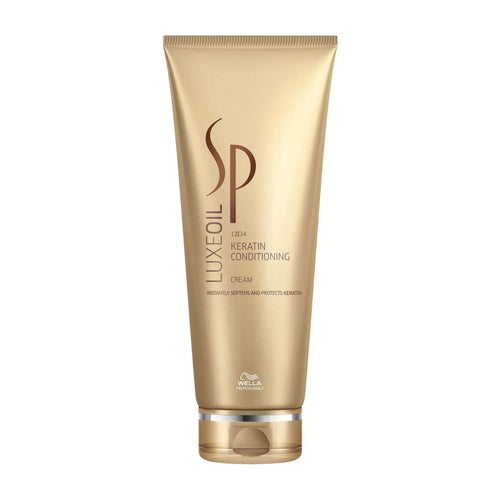 Gold tube of Wella SP Luxe Oil Keratin Conditioning Cream on a white background