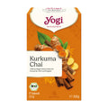 Yogi Kurkuma Chai tea box with ingredients on an orange background